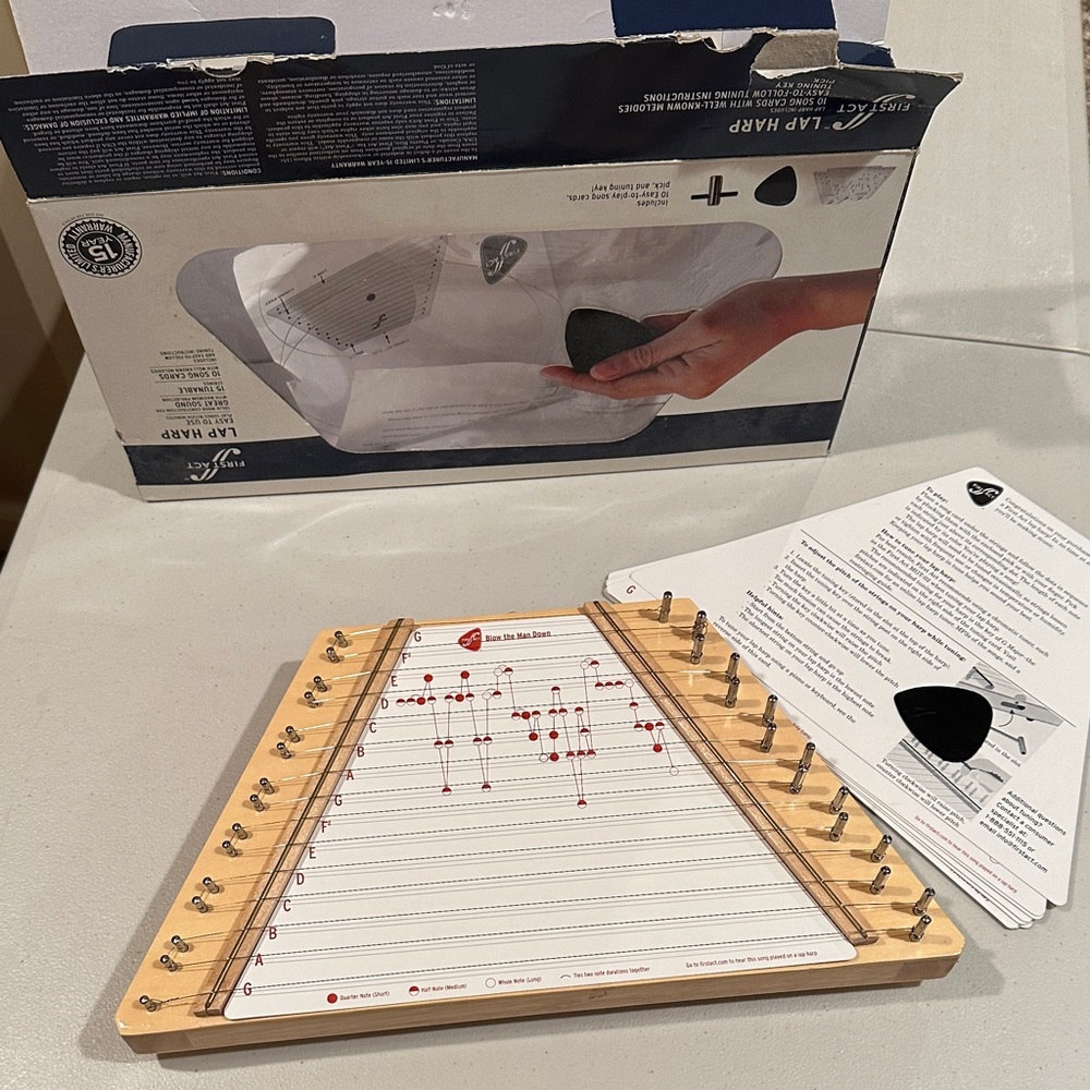 Lap Harp with Music Sheets